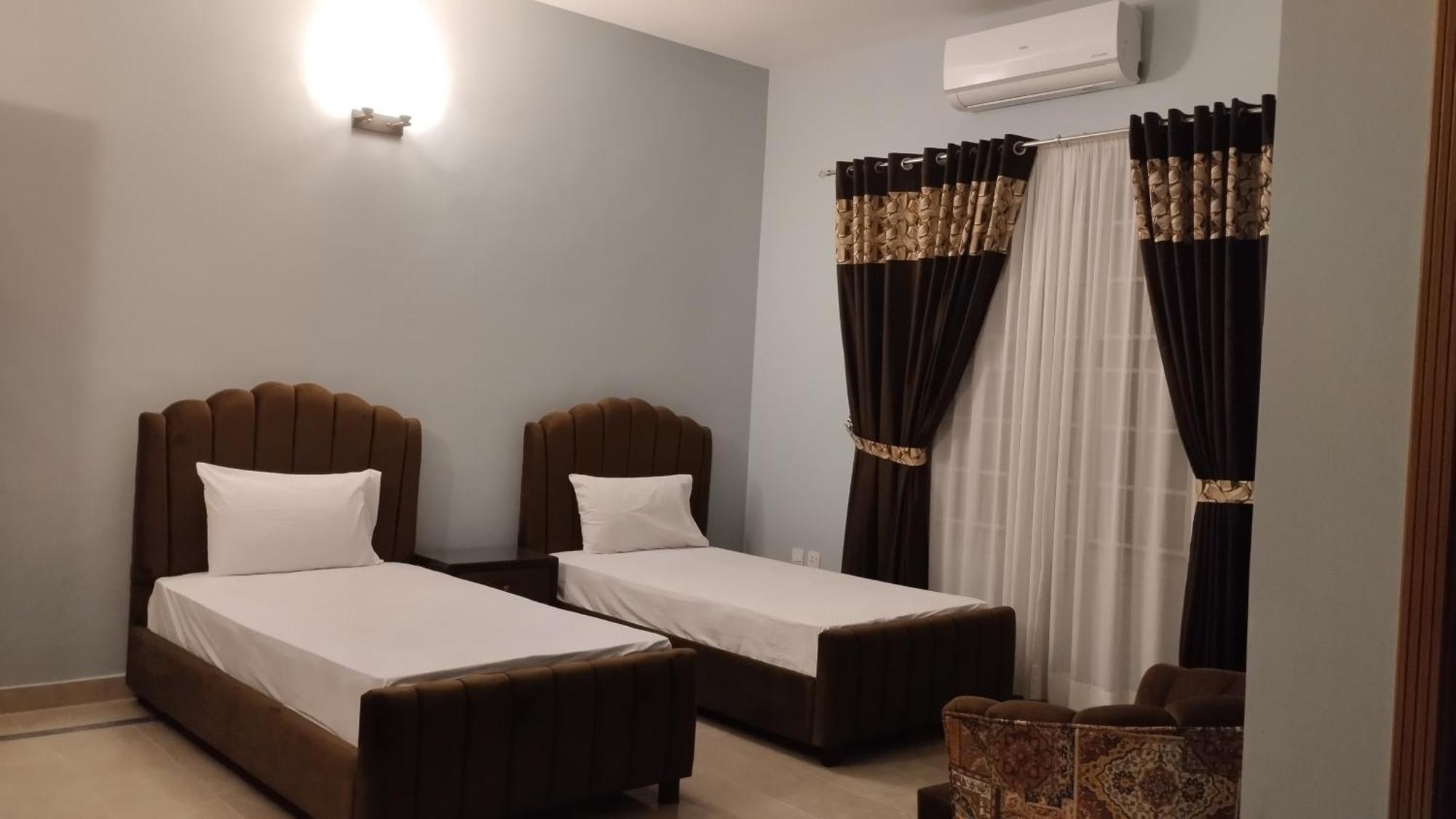 Islamabad Travelodge Guest House ห้อง รูปภาพ